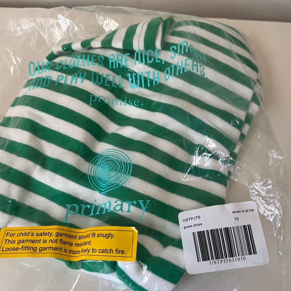 Primary long sleeve PJ top in grass stripe. Size 10